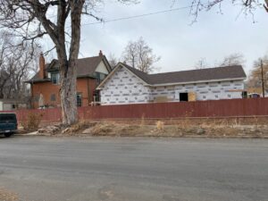 Denver home addition exterior with sheathing in progress