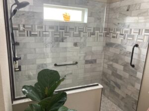 Finished bathroom tile shower from a garage conversion project