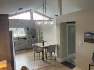 Finished kitchen and dining area in a garage conversion project
