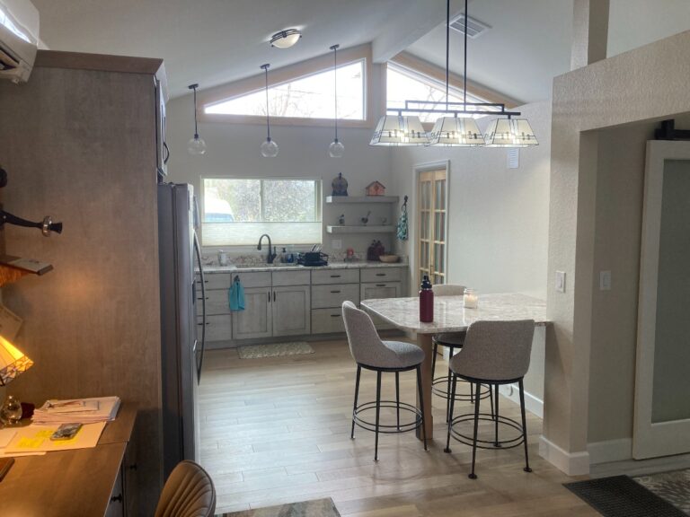 Finished garage conversion kitchen and living space by Culligan Construction